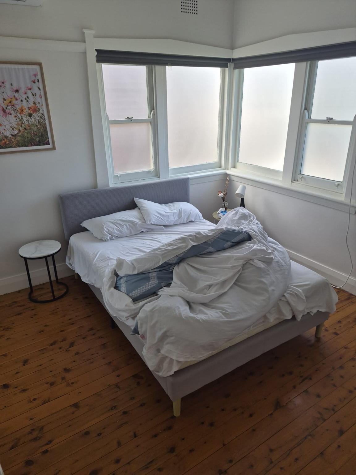 Airbnb bedroom before cleaning
